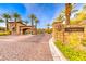 Stone gate entrance to the Tremezzo community at 70 Portezza Dr, Henderson, NV 89011