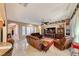 Spacious living room with leather furniture and a large TV at 70 Portezza Dr, Henderson, NV 89011