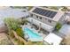 Two-story home with solar panels, pool, and pergola at 7306 Puckershire St, Las Vegas, NV 89166