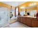 Double vanity bathroom with soaking tub and walk-in shower at 7306 Puckershire St, Las Vegas, NV 89166