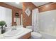 Clean bathroom with a bathtub, shower, and updated vanity at 7306 Puckershire St, Las Vegas, NV 89166