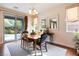 Formal dining room with hardwood floors and backyard access at 7306 Puckershire St, Las Vegas, NV 89166