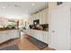 Open concept kitchen with tile flooring and lots of counter space at 7306 Puckershire St, Las Vegas, NV 89166