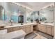 Double vanity bathroom with a large mirror and plenty of counter space at 7456 Ute Meadows Cir, Las Vegas, NV 89129