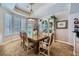 Elegant dining room with a formal table and hutch at 7456 Ute Meadows Cir, Las Vegas, NV 89129