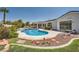 Spacious pool with flagstone patio and landscaping at 7456 Ute Meadows Cir, Las Vegas, NV 89129