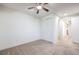 Spacious bedroom with ceiling fan and ample closet space at 7525 Royal Crystal St, Las Vegas, NV 89149