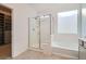 Bathroom with shower, bathtub and walk-in closet at 8031 Tank Loop St, Las Vegas, NV 89166