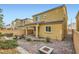 Back exterior with paver patio and landscaping at 8031 Tank Loop St, Las Vegas, NV 89166