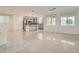 Bright and airy living room with tile floors and high ceilings at 8031 Tank Loop St, Las Vegas, NV 89166