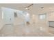 Bright and airy living room with high ceilings and tile floors at 8031 Tank Loop St, Las Vegas, NV 89166