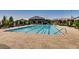 Community pool with spacious deck and lounge area at 8031 Tank Loop St, Las Vegas, NV 89166