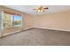 Large bedroom with window offering an outdoor view at 8220 Fawn Heather Ct, Las Vegas, NV 89149