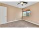 Cozy bedroom with ceiling fan and window coverings at 8220 Fawn Heather Ct, Las Vegas, NV 89149