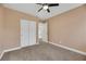 Bright bedroom with double door closet and window at 8220 Fawn Heather Ct, Las Vegas, NV 89149