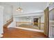 Open dining room with hardwood floors and a view of the living room at 8220 Fawn Heather Ct, Las Vegas, NV 89149