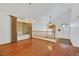 Spacious dining room with hardwood floors and a chandelier at 8220 Fawn Heather Ct, Las Vegas, NV 89149