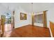 Bright dining area with hardwood floors and a chandelier at 8220 Fawn Heather Ct, Las Vegas, NV 89149