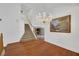 Elegant dining room with hardwood floors and a chandelier at 8220 Fawn Heather Ct, Las Vegas, NV 89149