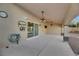 Covered patio with ceiling fans, providing shade and comfort at 8220 Fawn Heather Ct, Las Vegas, NV 89149