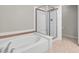 This bathroom has a shower, a tub and tile flooring at 840 Picotte St # 101, Las Vegas, NV 89144