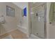 Bathroom with shower and tub, good lighting, and tile flooring at 8777 W Maule Ave # 1094, Las Vegas, NV 89148