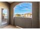 Private balcony with arched window offering distant views at 9000 Las Vegas Blvd # 2243, Las Vegas, NV 89123