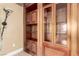 Wood built-in shelves with glass doors and detailed trim at 9000 Las Vegas Blvd # 2243, Las Vegas, NV 89123