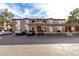 Tan colored building with covered parking and landscaped grounds at 9000 Las Vegas Blvd # 2243, Las Vegas, NV 89123