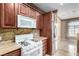 White appliances and granite countertops in this kitchen at 9000 Las Vegas Blvd # 2243, Las Vegas, NV 89123