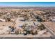 Aerial view of house, pool, and surrounding neighborhood at 9390 Stange Ave, Las Vegas, NV 89129