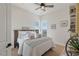 Bright bedroom featuring a comfortable bed and built-in shelving at 9390 Stange Ave, Las Vegas, NV 89129