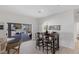 Kitchen breakfast nook with table and chairs, view to backyard at 9390 Stange Ave, Las Vegas, NV 89129