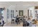 Rustic dining area with barrel table and pendant lighting at 9390 Stange Ave, Las Vegas, NV 89129