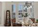 Bright dining area with wicker chairs and elegant decor at 9390 Stange Ave, Las Vegas, NV 89129