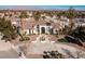 Elegant home exterior with fountain and palm trees at 9390 Stange Ave, Las Vegas, NV 89129