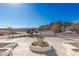 Front yard with fountain and mountain views at 9390 Stange Ave, Las Vegas, NV 89129