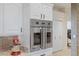 Stainless steel double oven and white shaker cabinets in this kitchen at 9390 Stange Ave, Las Vegas, NV 89129