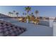 Spacious rooftop deck with city views and a pool in the background at 9390 Stange Ave, Las Vegas, NV 89129