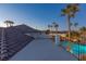 Relaxing rooftop deck offering a stunning view of the pool and surrounding landscape at 9390 Stange Ave, Las Vegas, NV 89129