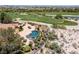 Aerial view of a home with a pool, spa, and expansive backyard at 1 Panorama Crest Ave, Las Vegas, NV 89135