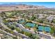 Aerial view of community with tennis courts and homes at 1 Panorama Crest Ave, Las Vegas, NV 89135