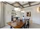 Formal dining room with dark wood table and statement lighting at 1 Panorama Crest Ave, Las Vegas, NV 89135