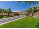 Gated entrance to a community with landscaping at 1 Panorama Crest Ave, Las Vegas, NV 89135