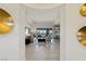 Bright entryway with tile floors and modern wall art leading to the living room at 1 Panorama Crest Ave, Las Vegas, NV 89135