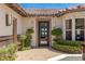 Front entry with modern glass door and view to living room at 1 Panorama Crest Ave, Las Vegas, NV 89135