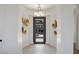 Elegant entryway with a modern door and decorative wall accents at 1 Panorama Crest Ave, Las Vegas, NV 89135