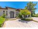 Front entry of house with landscaping and paved driveway at 1 Panorama Crest Ave, Las Vegas, NV 89135