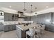 Modern kitchen with stainless steel appliances and a marble countertop at 1 Panorama Crest Ave, Las Vegas, NV 89135