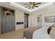 Main bedroom with fireplace, built-in cabinets and calming color scheme at 1 Panorama Crest Ave, Las Vegas, NV 89135